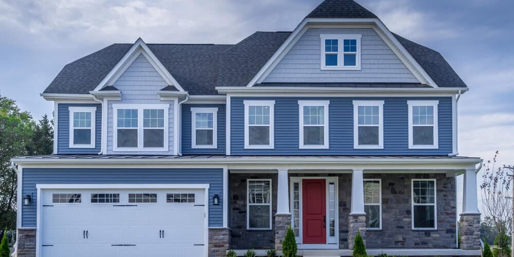New siding on colonial home. New siding on colonial home.