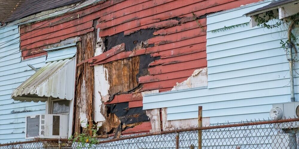 Siding needing to be fixed on side of home. Siding needing to be fixed on side of home.