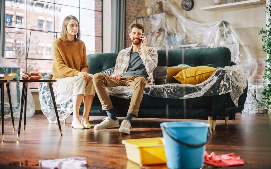 Roof Leaks at Home: Panic Couple Calling Insurance Company