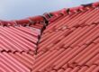 Roofing Problems. Red Roof Was Damaged By bad weather.