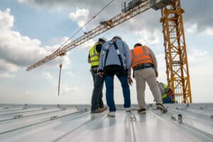 Commercial Property. Professionals inspecting commercial roof.