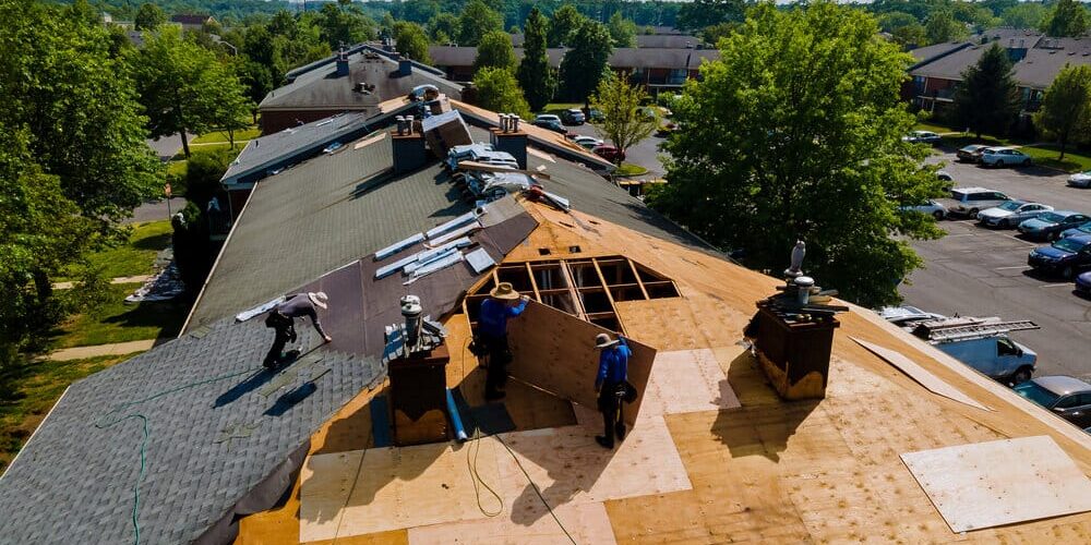 Roof Replacement. Roof Shingles Need With New Shingles On A home roof. Roof Replacement. Roof Shingles Need With New Shingles On A home roof.