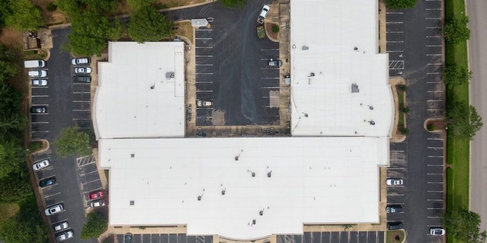 Commercial,Flat,Tpo,Roof,Drone,Inspection:,New,And,Old,Roofs, How Does Roof Asset Management Benefit Commercial Clients? Commercial Flat TPO Roof Drone Inspection: New and Old Roofs.