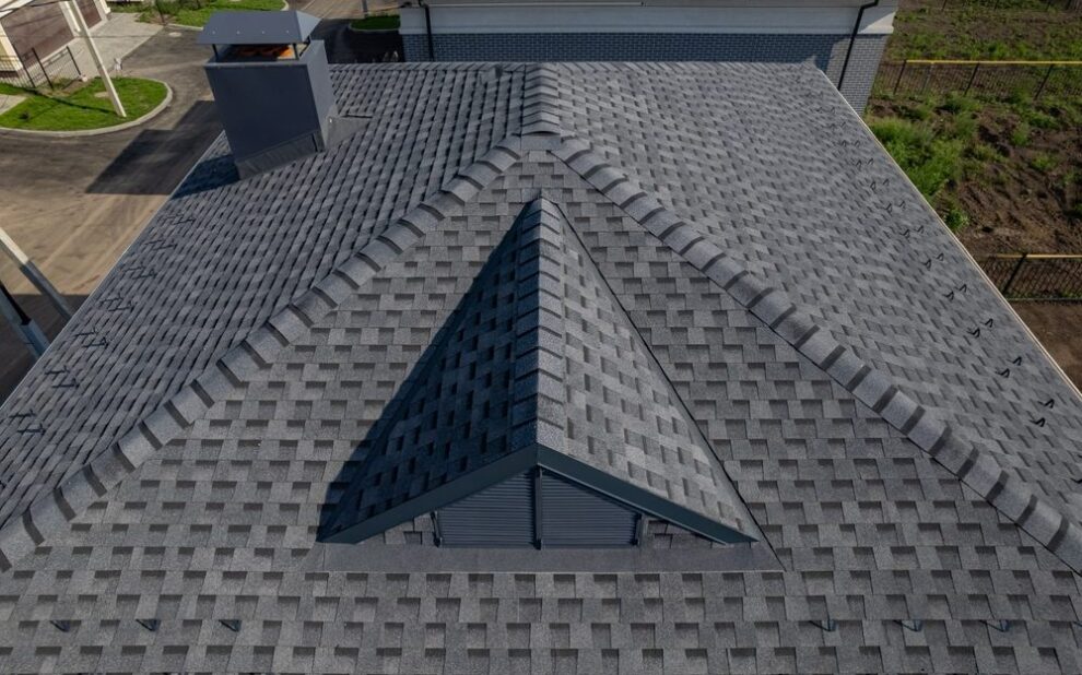 When Should Ottawa Homeowners Replace Shingle Roofs? Shingles texture - close up view of asphalt roofing shingles.