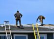 Finding the Best Roofing Contractors Near You: A Guide for Ottawa. Two Men Roofing a House in the Sun in Spring.