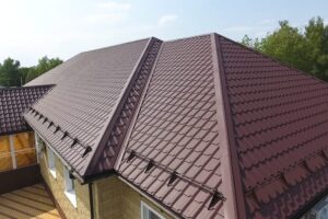 The Comprehensive Guide to Roof Replacement for Ottawa Homeowners in 2026. Modern roof made of metal. Corrugated metal roof and metal roofing.