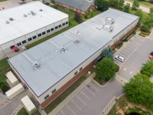 Commercial Roofing in Ottawa: A Strategic Guide for Property Resilience in 2026. Drone Images of Metal Commercial Roofs: Sunny, No People, Industry, Roofing, Trades.
