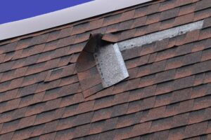 How Timely Roof Repair in Ottawa Protects Your Home & Wallet. Damaged Brown Roof Shingle - Wind Damage.
