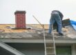 How to Identify When Your Ottawa Roof Needs Repair: A Homeowner’s Guide. worker install new shingle on the roof of the house for roof repair