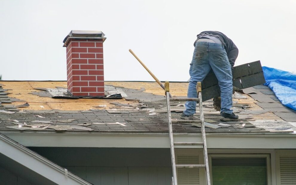 How to Identify When Your Ottawa Roof Needs Repair: A Homeowner’s Guide. worker install new shingle on the roof of the house for roof repair