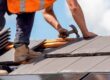 Choose the Best Residential Roofing for Your Ottawa Home Renovation. Construction worker roofers installing roofing tiles on residential building.